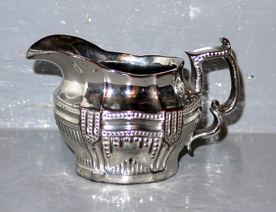 silver form milk jug